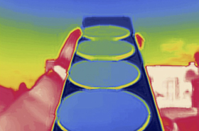 Silicon wafers coated with the gradient ENZ materials viewed through a thermal imaging camera.