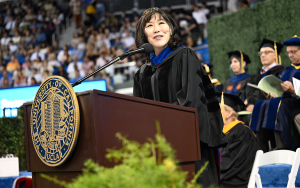 Dean Ah-Hyung “Alissa” Park addressing the graduates