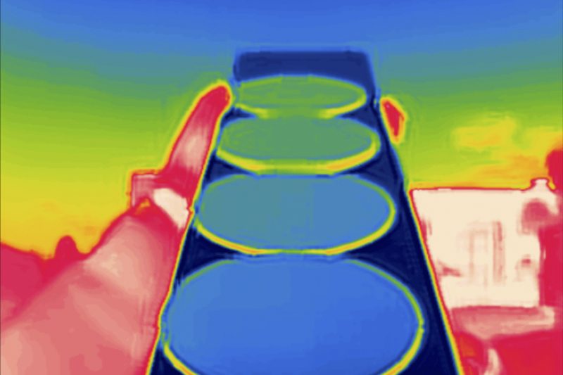 Silicon wafers coated with the gradient ENZ materials viewed through a thermal imaging camera.